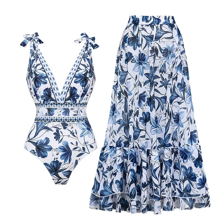 Blue floral one piece swimsuit and matching skirt